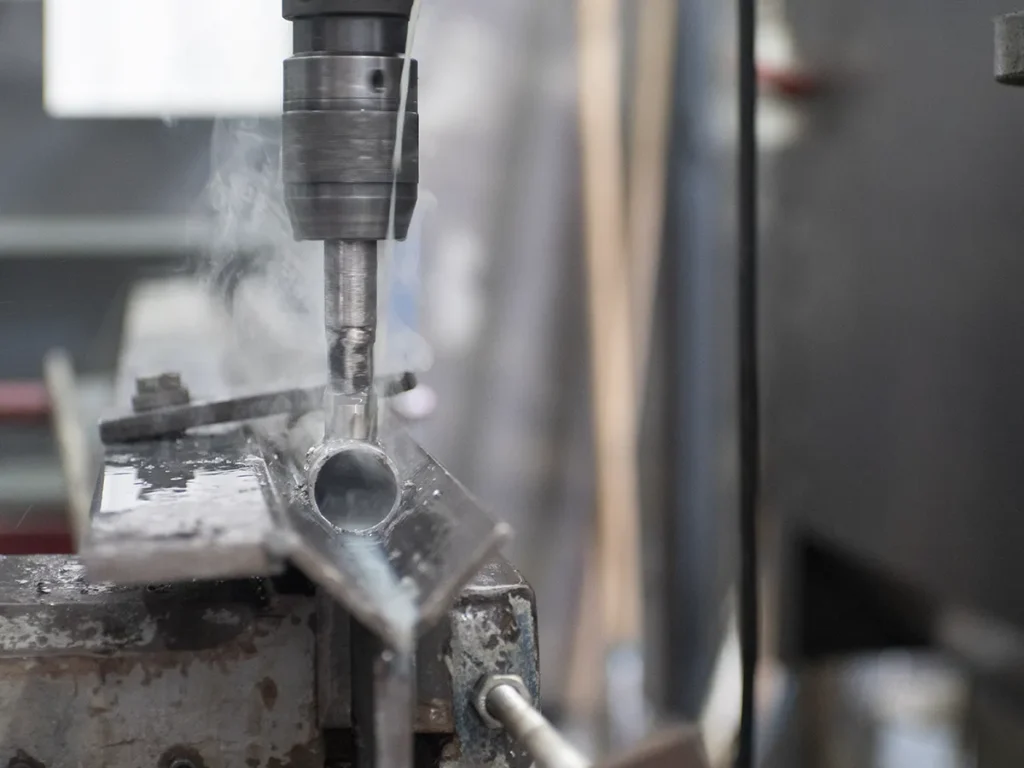 fresatura collettore idrico in acciaio inox
